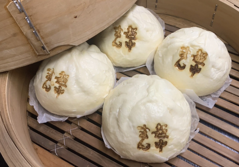 蒸籠に並ぶ越中まん 極